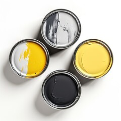 Cans with yellow, grey and black paint on a white background, top view. Open metal cans with yellow and black paint on top, isolated on a white background.