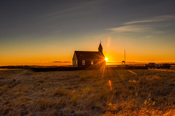 The Black Church of Budir at sunset,  Iceland