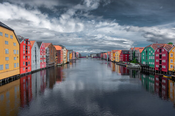 Beautiful view of the colorful wooden buildings of Trondheim Canal,  Norway