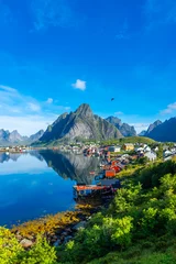 Papier Peint photo autocollant Reinefjorden Perfect reflection of the Reine village on the water of the fjord in the Lofoten Islands,  Norway