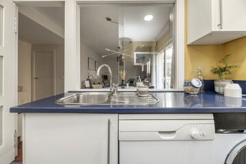Kitchen with stainless steel sink