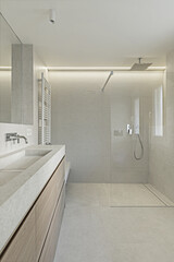 A spacious bathroom with a modern design