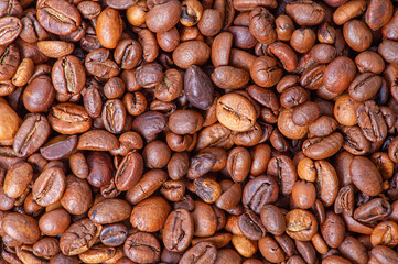 Roasted coffee beans as a background. Coffee beans.
