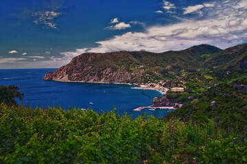 Fototapeta na wymiar Cinque Terre Mediterranean Sea views along town hiking trail Italian Riviera coastline. Liguria, Italy, Europe. 2023 Summer. 