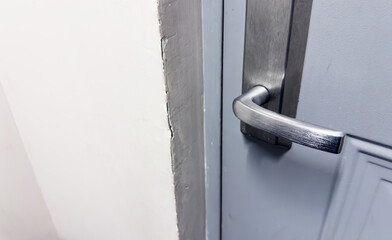 door handle close-up, portraying sophistication and access, inviting the viewer into a world of...