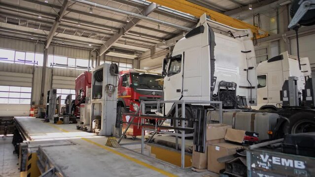 Spacious maintenance and repair station shop with truck tractors. Without people 