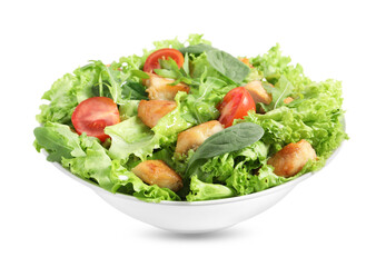 Delicious salad with chicken, cherry tomato and spinach isolated on white
