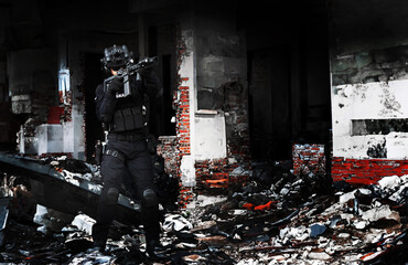 armed swat special forces army soldiers in combat camouflage uniform standing in brake building....