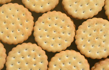 Detailed picture of round sandwich cookies with coconut filling. Background image of a close-up of several treats for tea