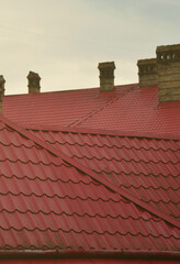 Fragment of a metal roof of the restored old multi-storey building in Lviv, Ukraine