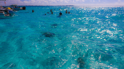 Beautiful view of Stingray city in the Cayman Islands in the Caribbean with turquoise blue green...