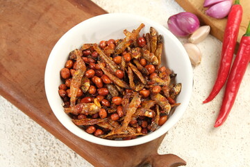 Sambal balado teri kacang is fried anchovy and peanuts with hot and spicy chili sauce.Traditional Indonesian food