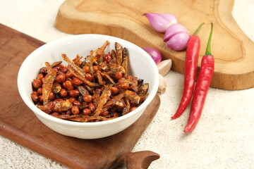 Sambal balado teri kacang is fried anchovy and peanuts with hot and spicy chili sauce.Traditional Indonesian food