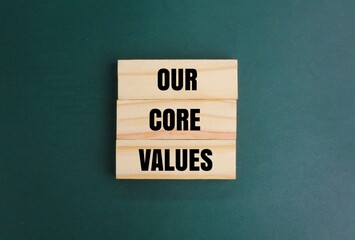 arrangement of wood with the words Our core values. concept of value