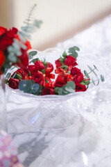 red and white flowers decoration in wedding ceremony