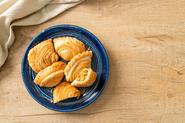 curry puff stuffed chicken on plate