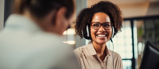 A happy woman or consultant discussing global tech support or service at an ecommerce startup, with a friendly biracial person virtually using a computer for business telecom. - Powered by Adobe