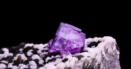 purple fluorite on muscovite with white dolomite and orange sheelite (from Yaogangxian mine, Chenzhou, Hunan, China) 360° full rotation on black background. Yaogangxian, hunan, china.