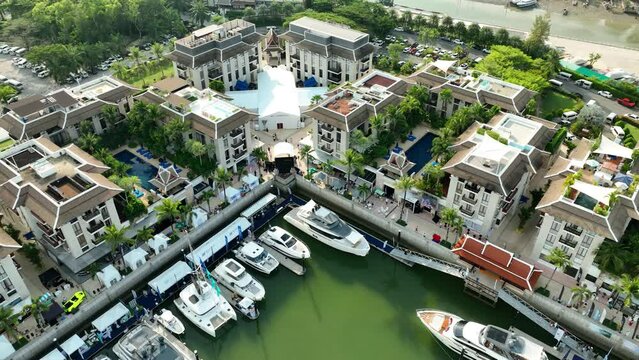 
Phuket, Thailand - January 12, 2023: annual, international yacht exhibition in Phuket Grand Marina, aerial video shooting
