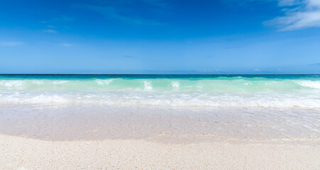 Fototapeta na wymiar Waves turquoise sea white sand on paradise island Boracay Philippines