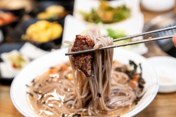 Buckwheat Noodles with Radish Water Kimchi with beef bbq