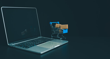 Boxes in a shopping car on a laptop keyboard. Ideas about online shopping, online shopping is a...