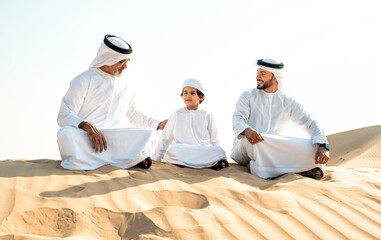 Three generation family making a safari in the desert of Dubai