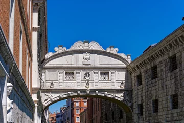 Cercles muraux Pont des Soupirs Close-up of famous Bridge of Sighs at Dodge's Palace over canal at City of Venice on a sunny summer day. Photo taken August 7th, 2023, Venice, Italy.