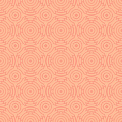 Pink seamless geometric pattern, peach shade of Pantone color 2024 for template. Texture of circles and arcs for creating wallpaper and textiles.