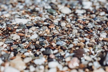 gravel texture, sea gravel. beach made of small stone. gravel on two sides