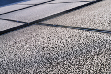 PV-modules with ice in winter on a roof