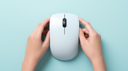 Top view of a hand using a wireless computer mouse for searching necessary information on an...