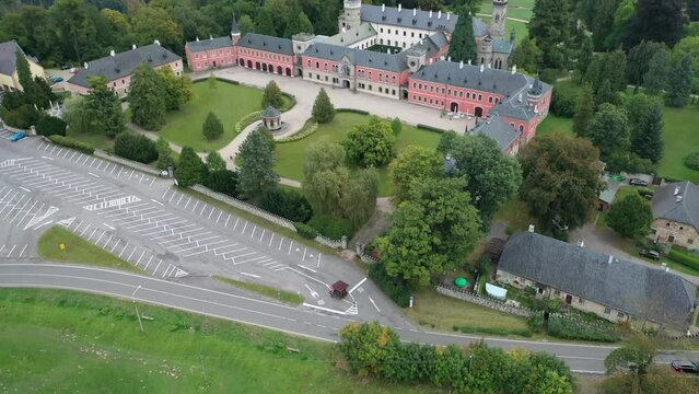 Impressive view of Sychrov castle buildings and park, Czech Republic