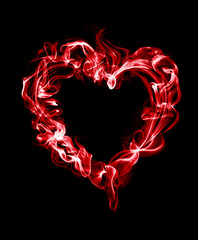 Heart smoke isolated on black background. red heart design made of transparent smoke. Symbol of...