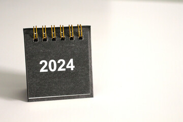 Calendar template for the new year, 2024. Place it elegantly on your clean, white work desk for a touch.