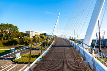 Pedestrian bridge near the seaport in the city of Ferrol in Spain. - obrazy, fototapety, plakaty