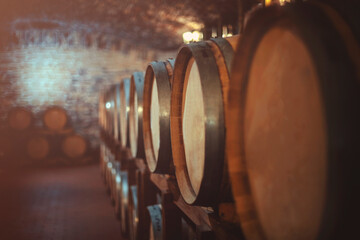 Old oak barrels in a wine cellar