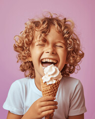 Happy Curly Boy Enjoying Ice Cream Cone on Pastel Pink Background