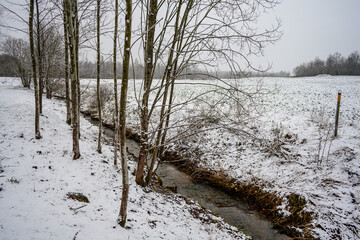 near frozen river in late autumn - 708443118