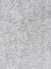 Texture of gray decorative plaster. Raised background or texture