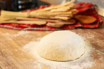 Sourdough bread. Homemade bread dough left to rise on the wood counter top inside a kitchen. Home bread making photo Bread baking.
