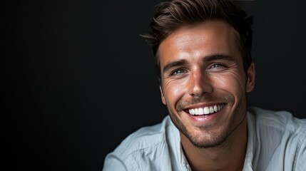 Fototapeta premium Smiling Man in White Shirt