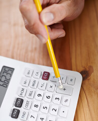 Accountant, hands and top view of calculator on table for asset management, financial planning or investment. Auditor, above and closeup of working at desk with pencil for tax, income and business