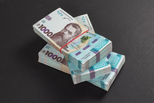 Stack of ukrainian money hryvnia. grivna, hryvna with 1000 banknotes