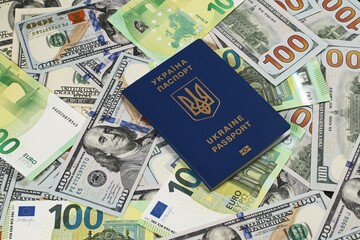 ukrainian passport and 100 euro and 100 dollars banknotes background