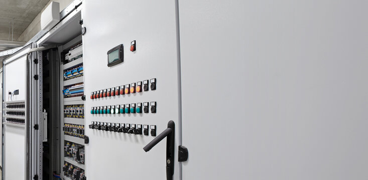 Electrical and electronic panel cabinet for automation and system control of industrial processes, Hvac, management of heating, ventilation, air conditioning and cooling. With copy space background