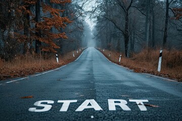 Start text on road to success. Symbolic journey concept with empty asphalt highway leading towards bright horizon perfect for business and motivational themes