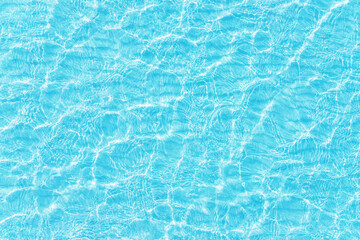 azure ocean background, light water texture with glittering waves, top view