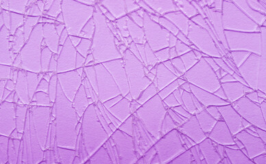 Amazing pattern of pastel purple cracked glass surface