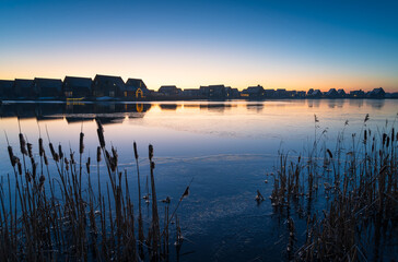 A new neighbourhood at the waterfront on a cold, winters morning in Meerstad, the Netherlands.